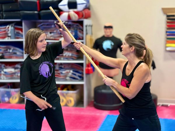 saijutsu student learning to block at douglas martial arts in moose jaw