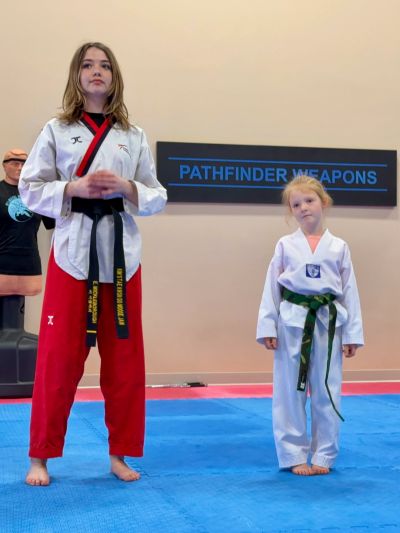 taekwondo youth instructor with little dragon at douglas martial arts in moose jaw