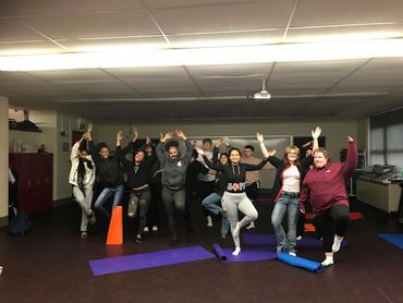 Students at Mundelein High School trying out yoga