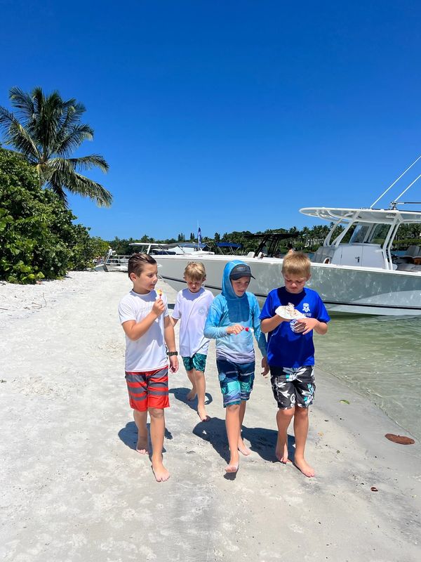 kids smiling and eating ice cream, ohana cruises, jupiter Florida things to do, vacation destination