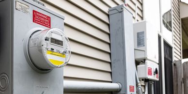 Residential electrical panel upgrade and meter base service repair.