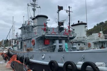 Close picture of a small size ship in a dockyard