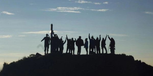 Travis Taliaferro Celebrating at the top of the Volcan Baru