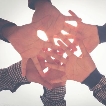 hands forming a star of davd.
