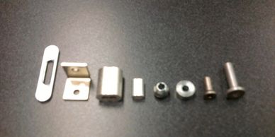 Various components: alum. sleeves, rivets, slides and other end components