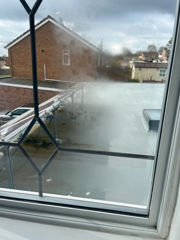 Misted double glazed leaded unit