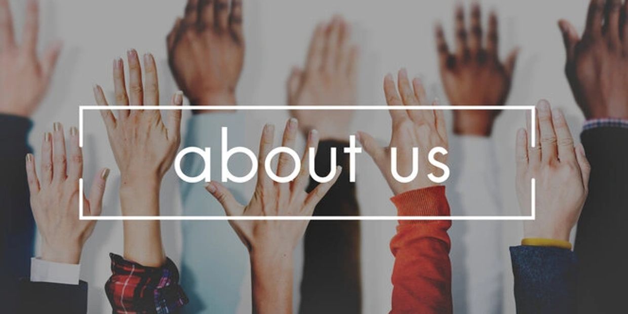Raised hands behind 'about us' text symbolizing diversity and inclusion.