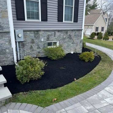 Exceptional lawncare of a yard by Pereira Landscaping in Hudson, MA.