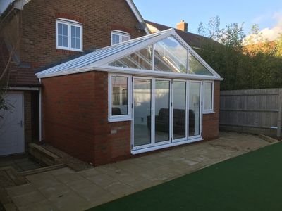 Lovely rear conservatory extension designed and built by mid sussex construction ltd 