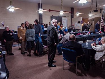 Guests at the event gather and visit.