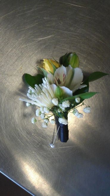 White flowers with a pin