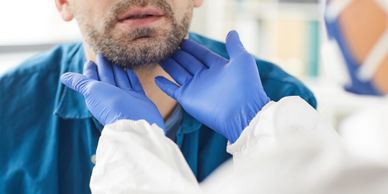 Doctor examining a man.