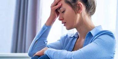 Hopeless woman lost in thoughts.