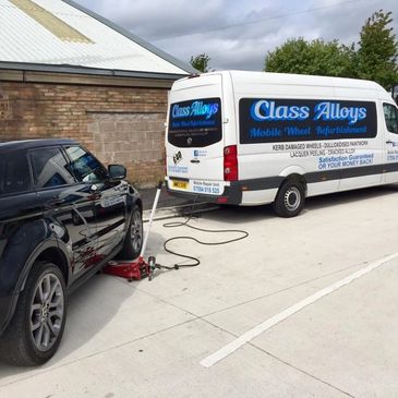 Class Alloys Mobile Wheel Repair and Refurbishment Van and Black Car