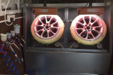 Mobile workshop repainting alloy wheels