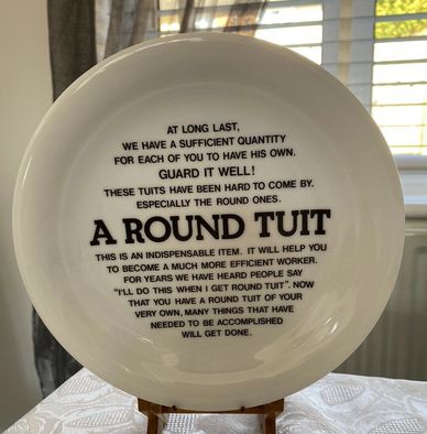 Plate inscribed with text says Round Tuit