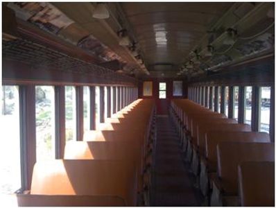 The interior view of the restored passenger cars.  The seats above use the original seat materials, 