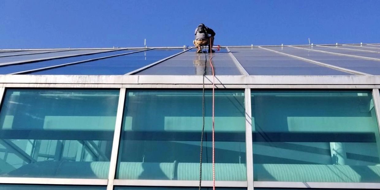 Commercial Rappelling Window Cleaning Services.