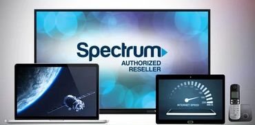 Devices displaying Spectrum authorized reseller and internet speed graphics.
