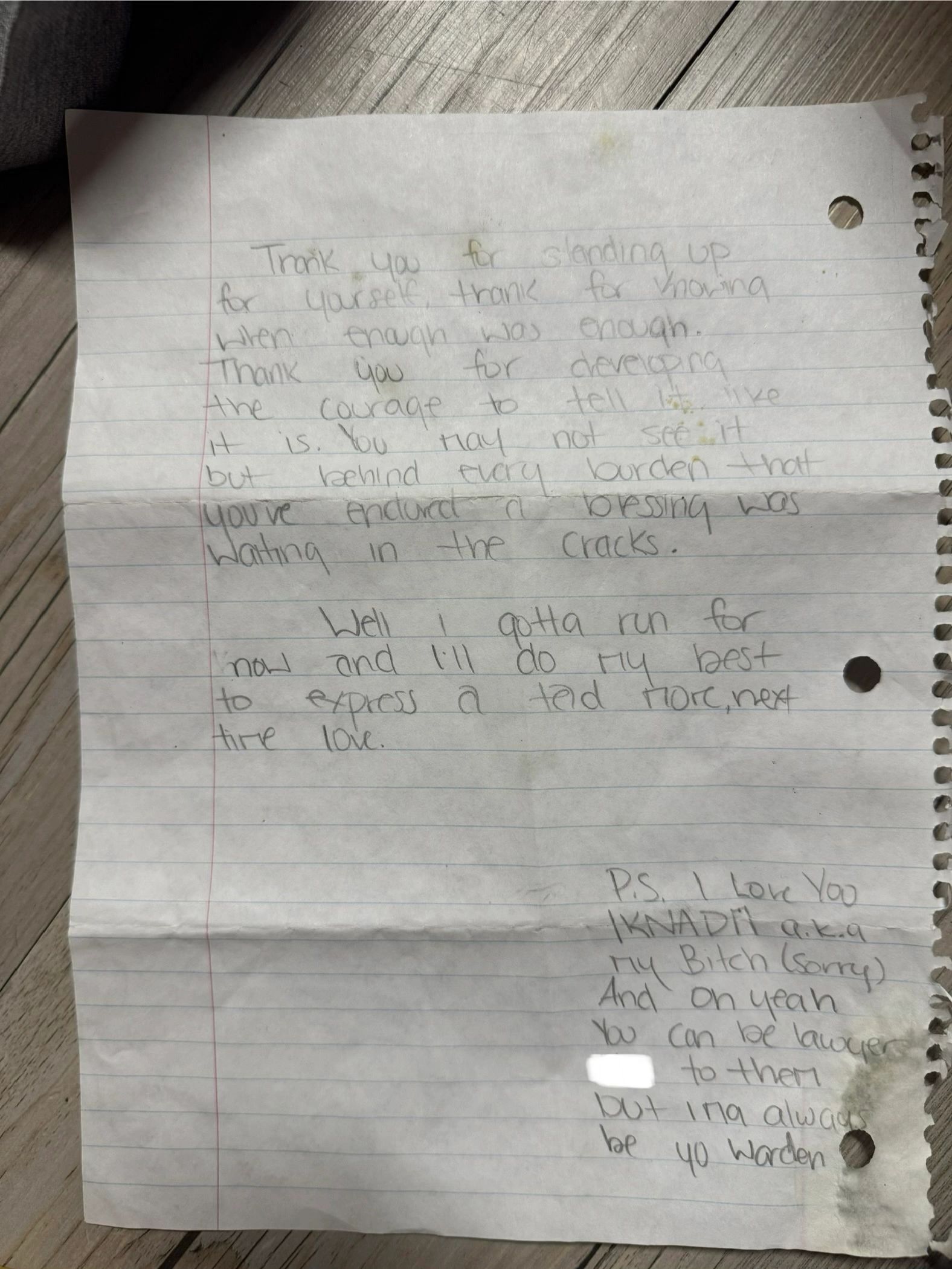Handwritten heartfelt letter on lined paper.