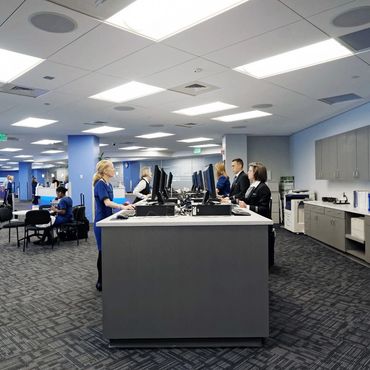 Modern airline operations area with staff stations, open layout, and integrated technology at DIA.