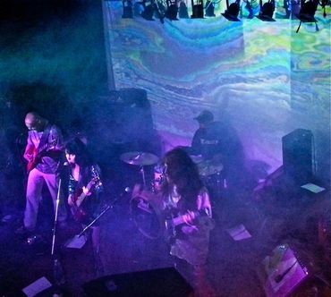 The rock band RXR playing at Jambalaya in Arcata, Ca. With light show artist Marmalade Sky.