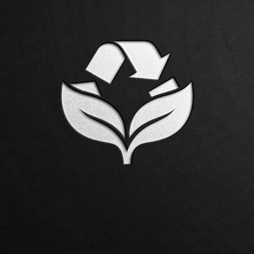 Recycling symbol integrated with two leaves on a dark background.