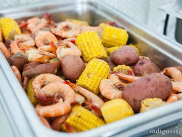 Low Country Boil at an outdoor wedding catered by ART Catering.
