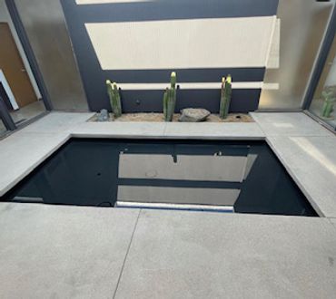 Mirrored entry way pond