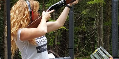 Amanda Lynn Mayhew with a Weatherby shotgun at Range Day in Ontario.