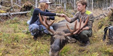 Mom and son on a moose hunt in Newfoundland, big bull moose.