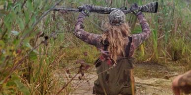 Amanda Lynn Mayhew waterfowl hunting with Ty Baynton.