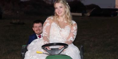 bride and groom on John Deere tractor at Stone Ridge Estates Wedding Venue, Pasco WA
