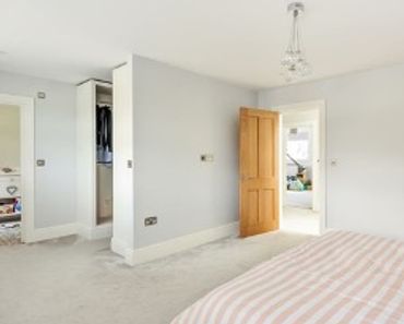 Bedroom renovated by Project Construction Group.