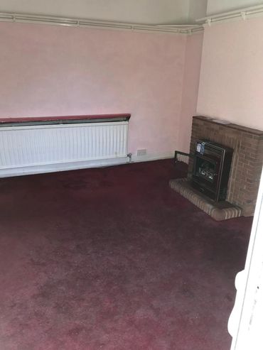 Lounge before renovation by Project Construction Group