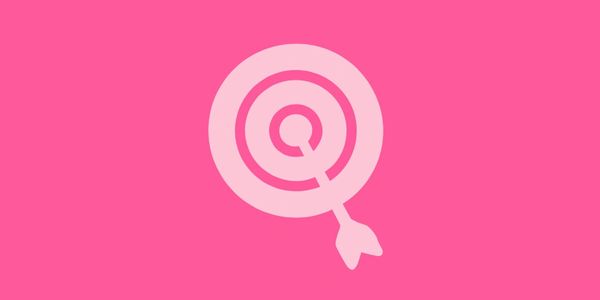 Pink target with an arrow in the center on a bright pink background.