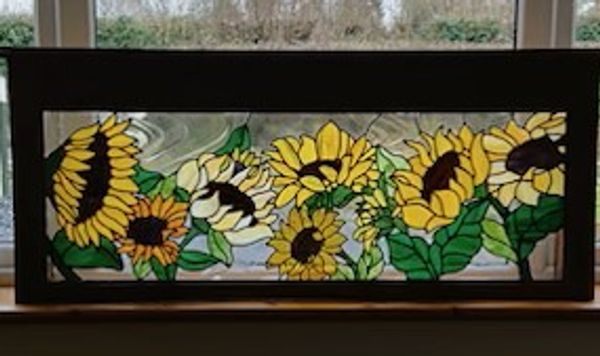 Example of a Private Commission done by Vetrate Art Showing a Window Privacy Screen with Sunflowers