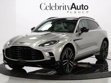 Sleek silver luxury SUV displayed in a showroom.