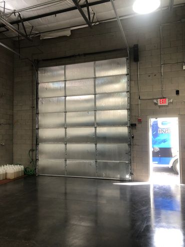 10-foot by 14-foot commercial garage door with R-6 insulation installed