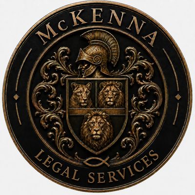 Logo of McKenna Legal Services with a lion-themed shield and helmet.