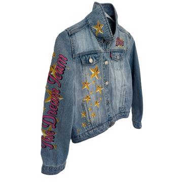Denim jacket with star and text designs. Perfect for acro, dance, cheer, and athletics gear.