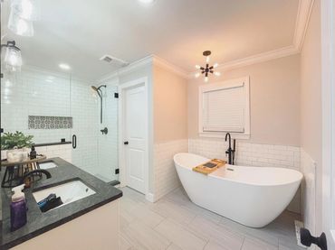 Tub 
White bathroom 
Farm house
