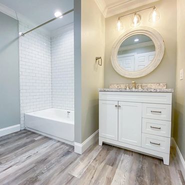 Vinyl plank floor
White vanity