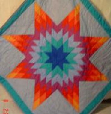 OFFICIAL SITE Diane's Native American Star Quilts.  https://www.dianesnativeamericanstarquilts.net
