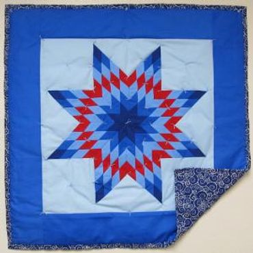 OFFICIAL SITE Diane's Native American Star Quilts.  https://www.dianesnativeamericanstarquilts.net