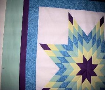 OFFICIAL SITE Diane's Native American Star Quilts.  https://www.dianesnativeamericanstarquilts.net