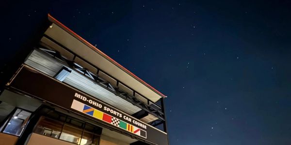 Night sky above Mid-Ohio Sports Car Course building.