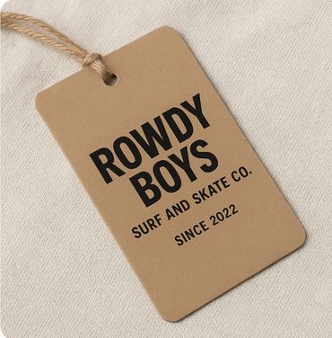 Brown clothing tag with "ROWDY BOYS SURF AND SKATE CO. SINCE 2022" text.