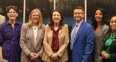 Peter Kwon with Senator Maria Cantwell and colleagues