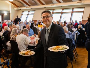 Peter serving at senior center